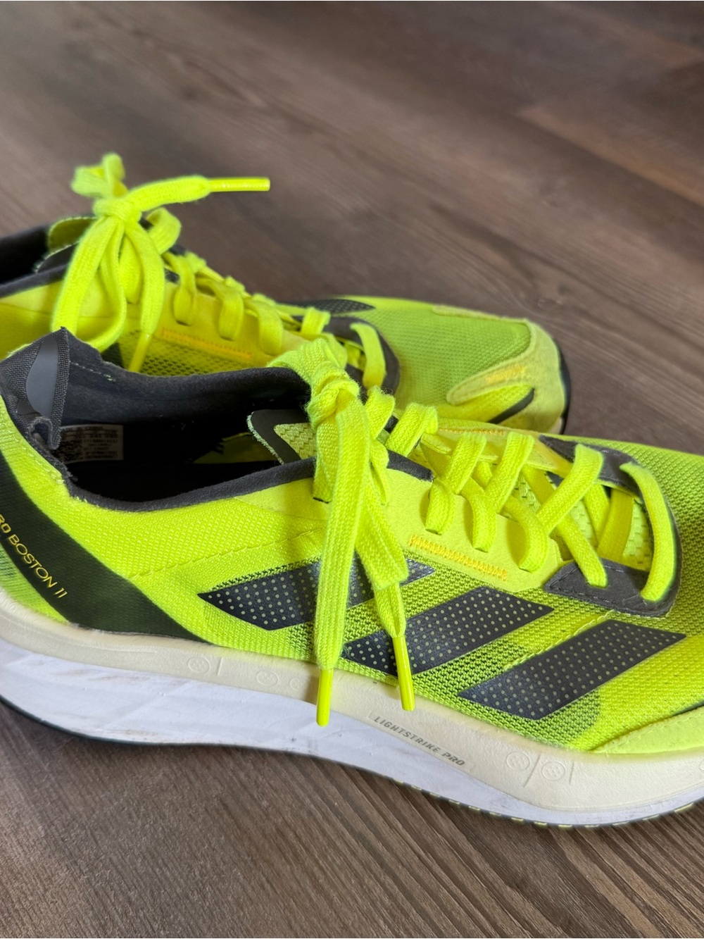 adidas Menโs High-Visibility Yellow Running Sneakers